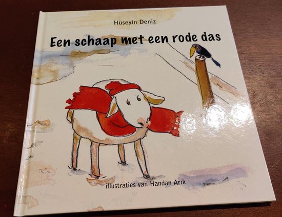 Een schaap met een rode das